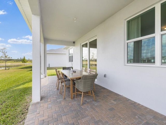 view of patio with outdoor dining space