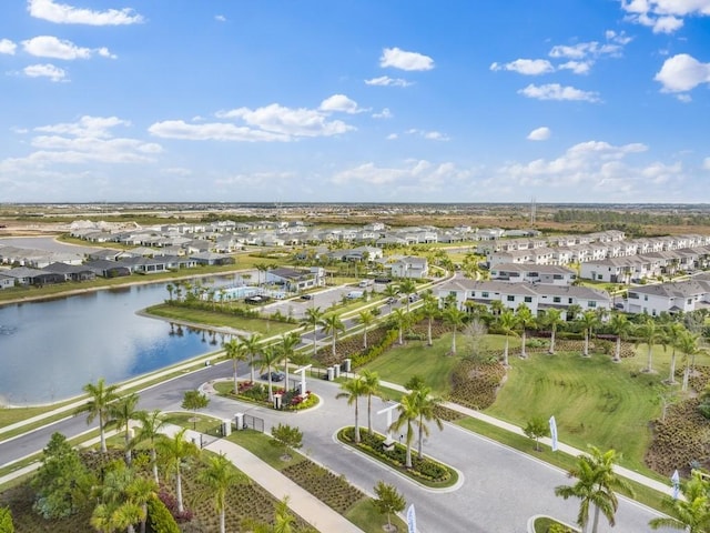 aerial view featuring a water view and a residential view