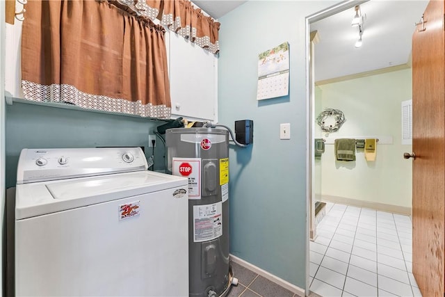 laundry area featuring washer / clothes dryer, water heater, light tile patterned floors, and cabinets