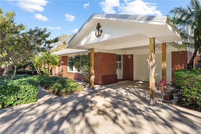 exterior space featuring a carport