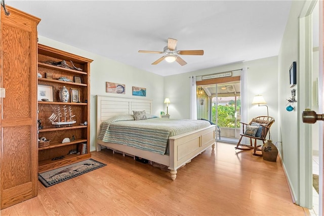 bedroom with ceiling fan and light wood-type flooring