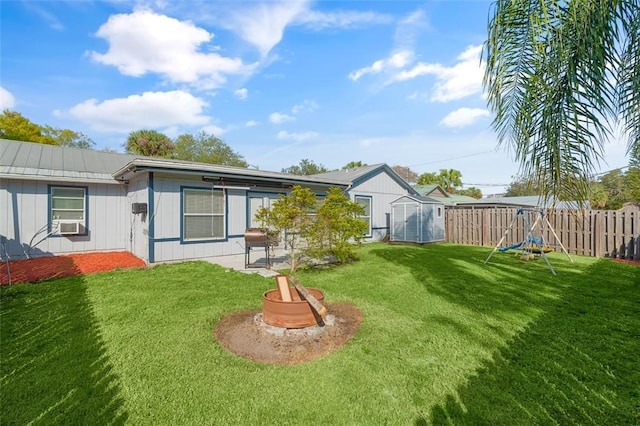 view of yard with a storage unit