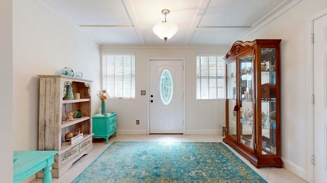 entrance foyer with light tile patterned floors and coffered ceiling