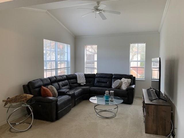 carpeted living room with vaulted ceiling, ceiling fan, and crown molding