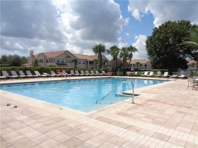 view of pool featuring a patio