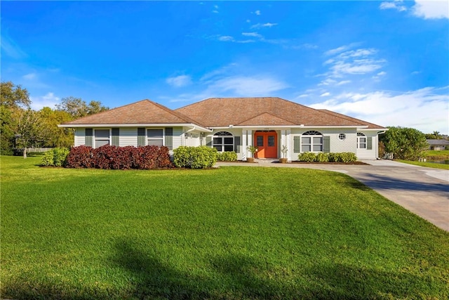 view of front of home with a front yard