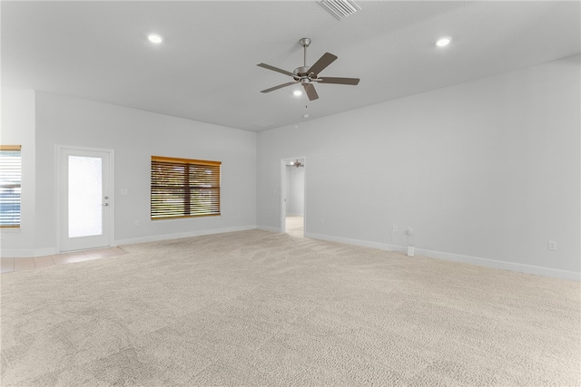 carpeted empty room with ceiling fan