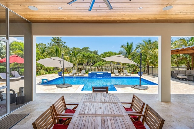 view of swimming pool featuring a patio area