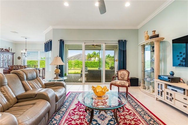 tiled living room featuring ceiling fan with notable chandelier and ornamental molding