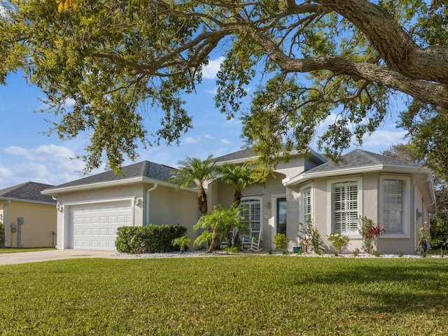 ranch-style house featuring a garage, driveway, roof with shingles, a front yard, and stucco siding