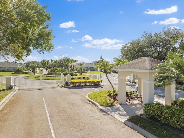 5765 W 1st Sq SW, Vero Beach, FL 32968 - view of home's community with a gate and fence