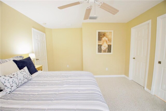 carpeted bedroom with ceiling fan