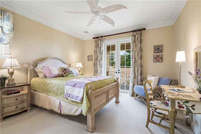 carpeted bedroom with ceiling fan, access to exterior, french doors, and ornamental molding