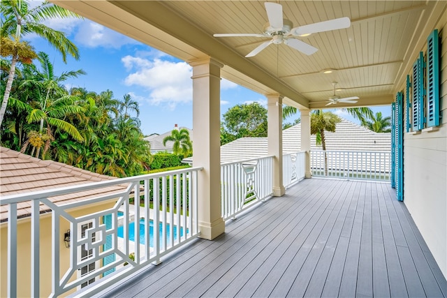 wooden terrace with ceiling fan