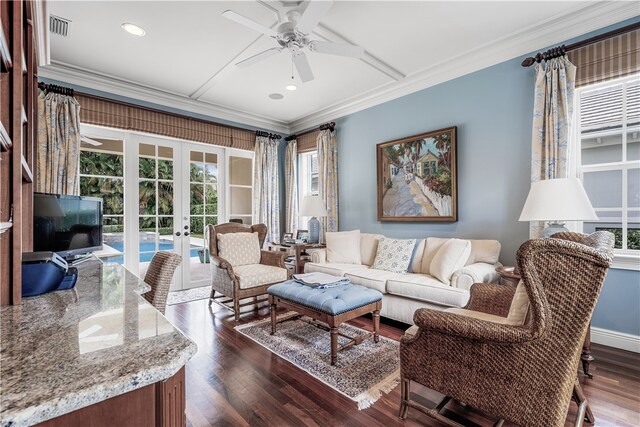 living room with dark wood-type flooring, french doors, and crown molding