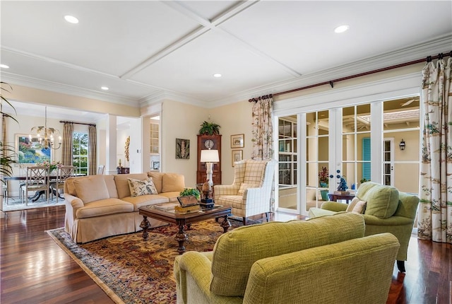 410 N Palm Island Cir, Vero Beach, FL 32963 - living area with a chandelier, dark wood-style flooring, recessed lighting, french doors, and ornamental molding