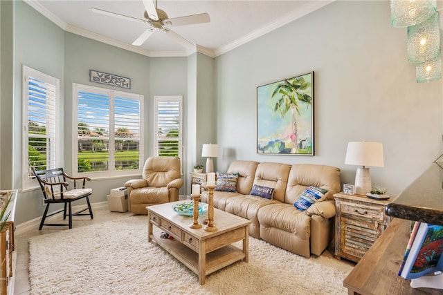 tiled living room with ornamental molding and ceiling fan