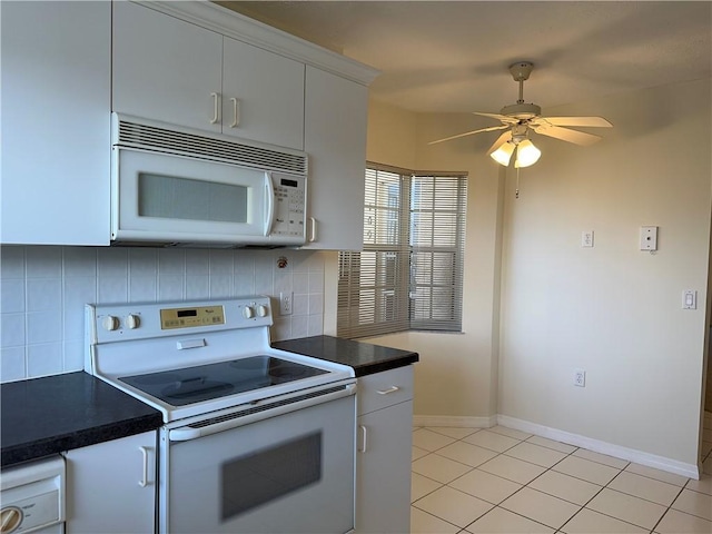 kitchen with tasteful backsplash, ceiling fan, white cabinets, and white appliances