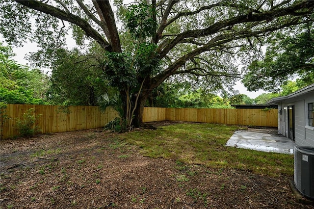 2313 2nd St SW, Vero Beach, FL 32962 - fenced backyard with a patio area and central AC