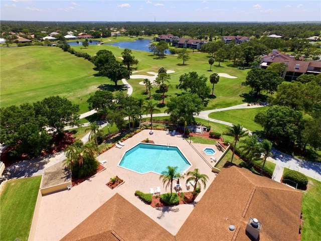 view of swimming pool with a water view and central AC