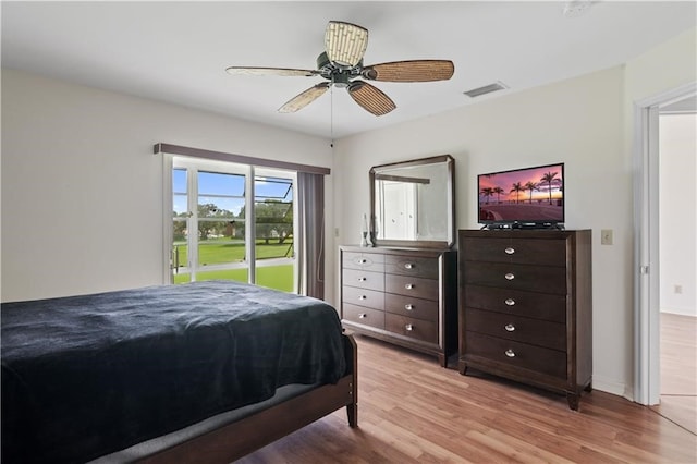 bedroom featuring ceiling fan and light hardwood / wood-style flooring