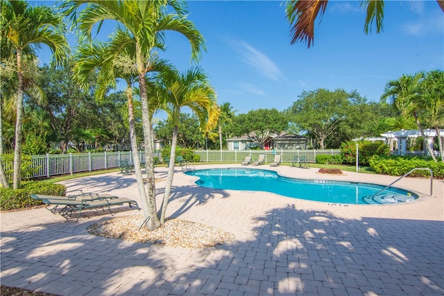 view of pool featuring a patio area