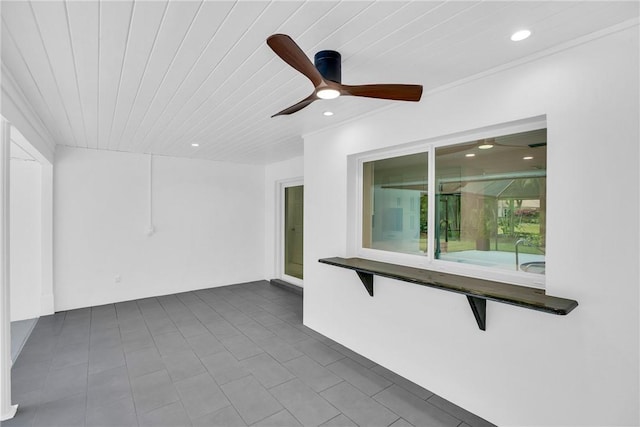 interior space featuring ceiling fan