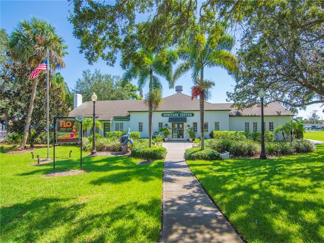 view of front of home with a front lawn