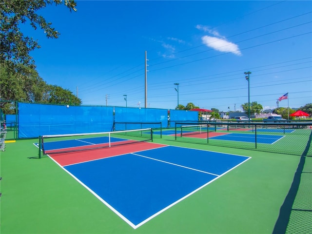 view of tennis court with basketball court