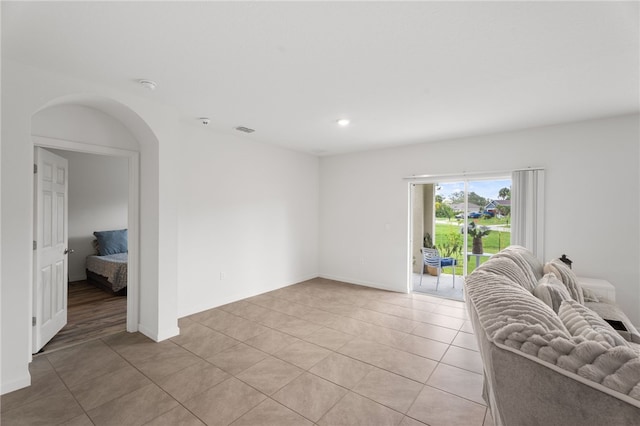 1093 Wabash Rd SE, Palm Bay, FL 32909 - living area featuring light tile patterned flooring