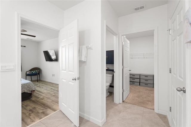 1093 Wabash Rd SE, Palm Bay, FL 32909 - corridor with light tile patterned floors and baseboards