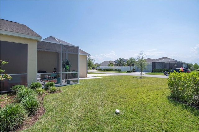 1440 Carriage Ct, Vero Beach, FL 32966 - view of green lawn featuring a lanai