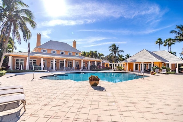 view of swimming pool featuring a patio area