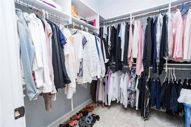 walk in closet featuring tile patterned floors