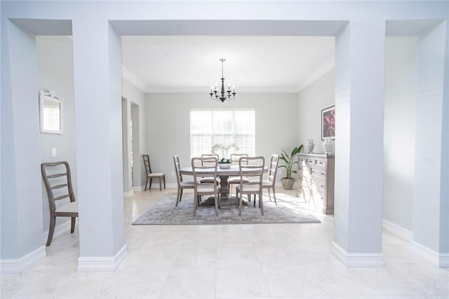 dining space featuring a chandelier and ornamental molding