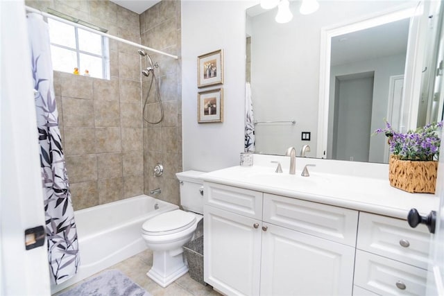 full bathroom featuring tile patterned floors, shower / bathtub combination with curtain, vanity, and toilet