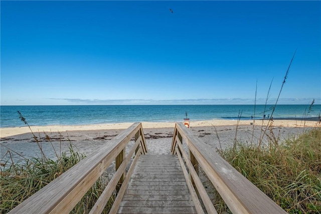 view of community featuring a view of the beach and a water view