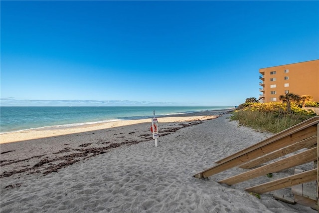 view of water feature with a beach view