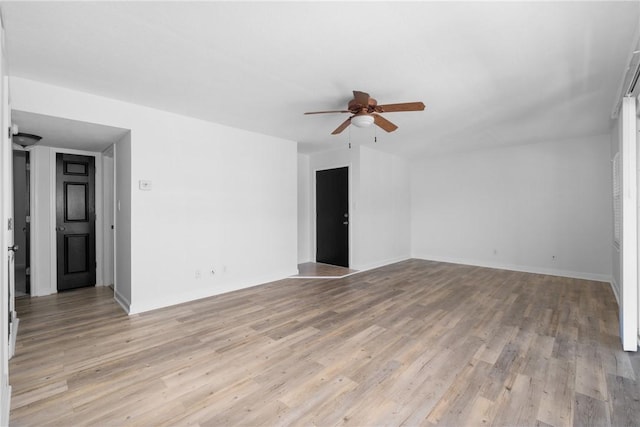 interior space featuring ceiling fan and light wood-type flooring