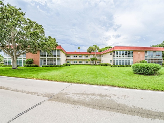 exterior space with a front lawn