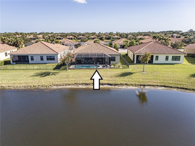 property view of water featuring fence