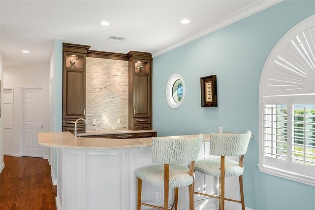 dining space with ceiling fan with notable chandelier