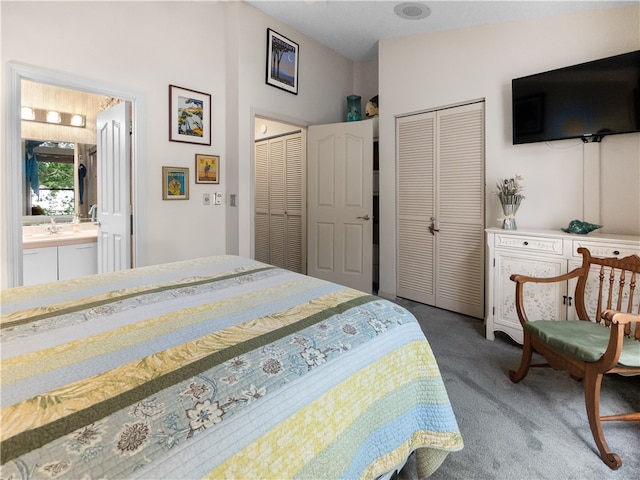 carpeted bedroom with ensuite bathroom