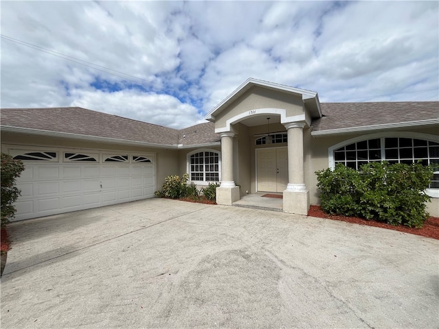 view of front of home featuring a garage