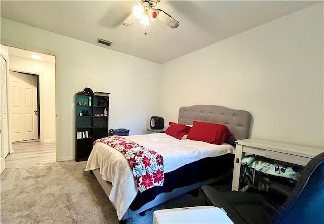 carpeted bedroom featuring ceiling fan