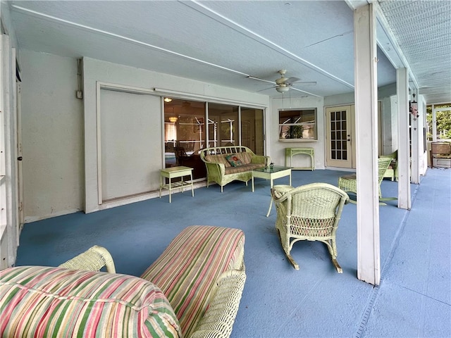 sunroom / solarium with ceiling fan