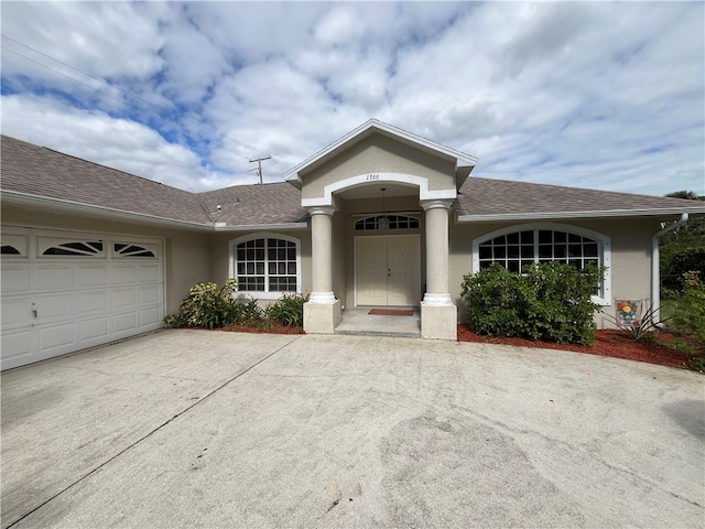 view of front of home featuring a garage