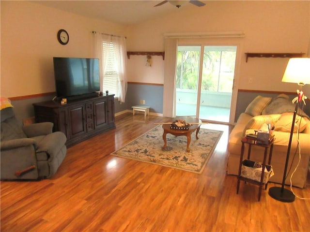 308 14th Pl SW, Vero Beach, FL 32962 - living area with a ceiling fan, vaulted ceiling, and wood finished floors