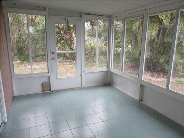 308 14th Pl SW, Vero Beach, FL 32962 - unfurnished sunroom featuring plenty of natural light