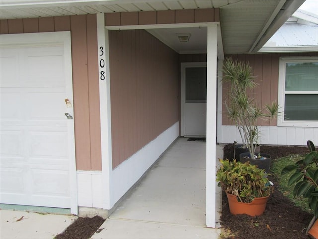 property entrance featuring a garage